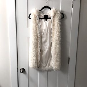 White faux fur vest with hood